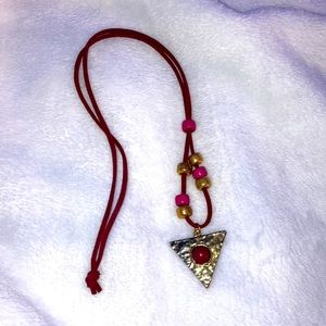 I am selling this red,pink,gold necklace